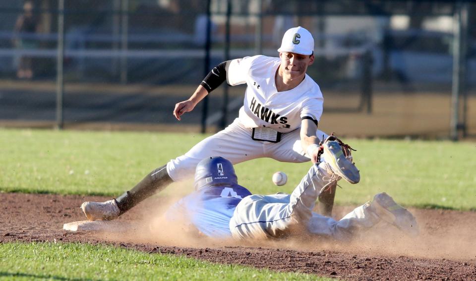 Horseheads' Lucas Granger steals second as Corning's Henry Jackson waits on the throw during the Blue Raiders' 8-5 win in a STAC West baseball tiebreaker May 11, 2022 at Corning-Painted Post High School.