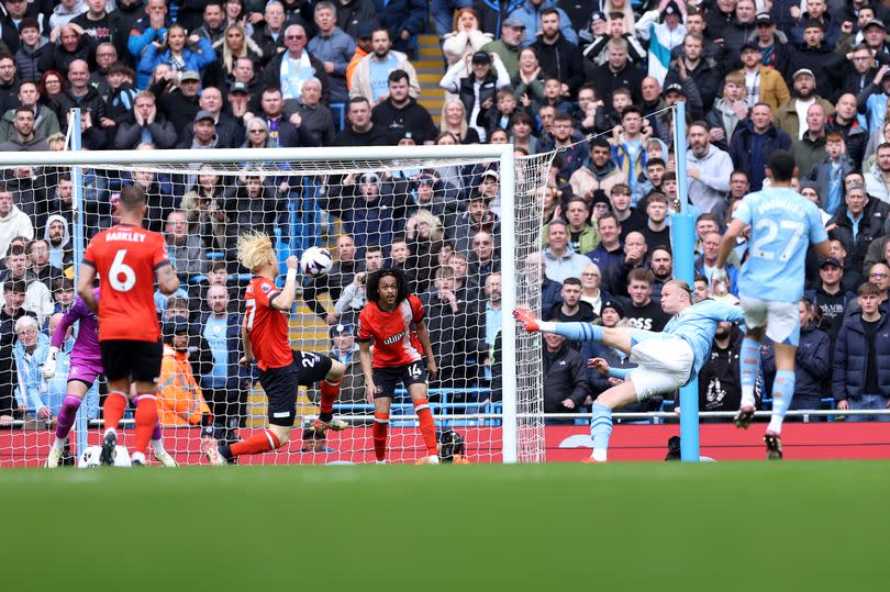 Erling Haaland's shot deflects off Daiki Hashioka