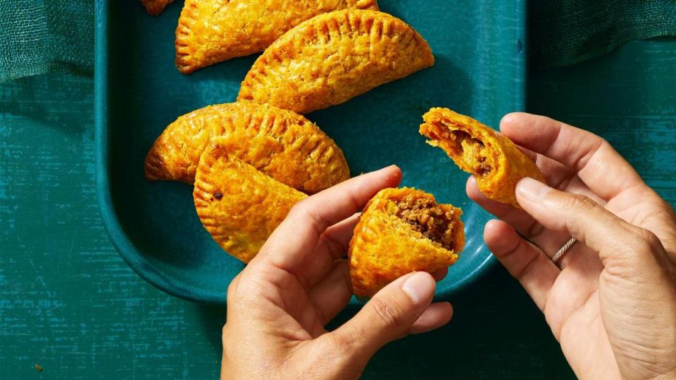 beef empanadas on a blue plate