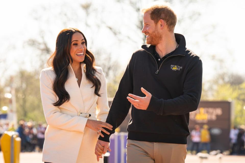 The Duke and Duchess of Sussex seemed happy and relaxed during their visit to the games on Sunday (Aaron Chown/PA) (PA Wire)