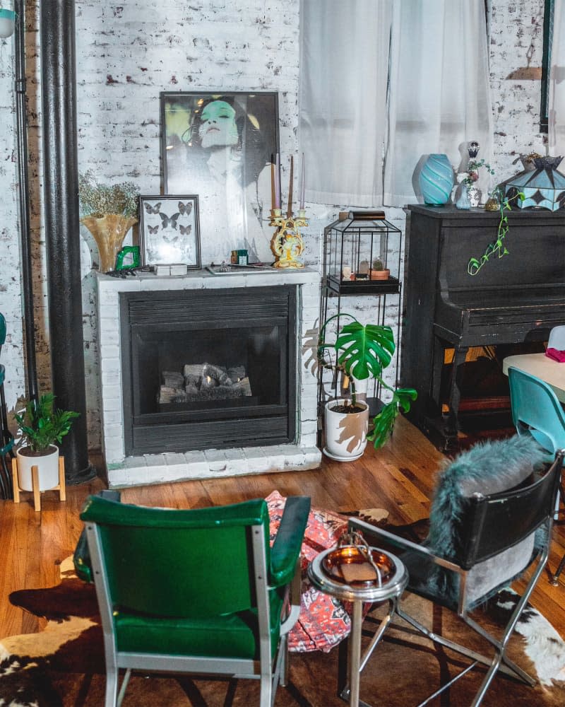 Brick fireplace in apartment.