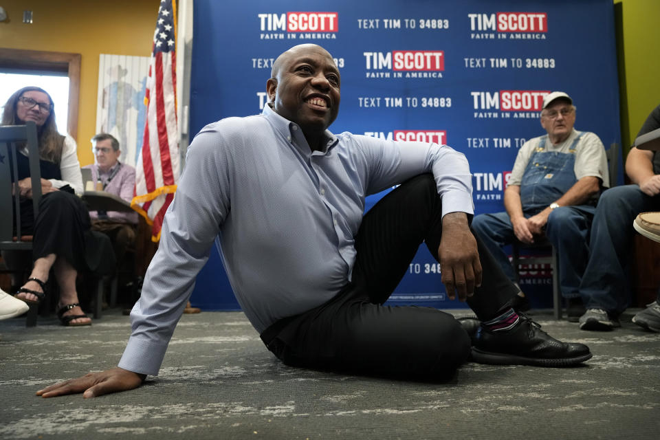 FILE - Republican presidential candidate Sen. Tim Scott, R-S.C., listens to a question from an audience member during a meet and greet, Monday, Sept. 18, 2023, in Fort Dodge, Iowa. (AP Photo/Charlie Neibergall, File)