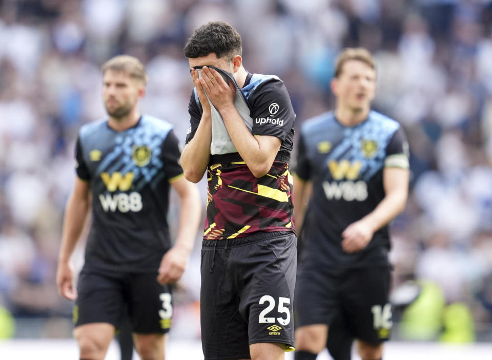 Burnley's Zeki Amdouni stands dejected at the final whistle following the English Premier League soccer match between Tottenham Hotspur and Burnley, at the Tottenham Hotspur Stadium, London, Saturday May 11, 2024. (Adam Davy/PA via AP)