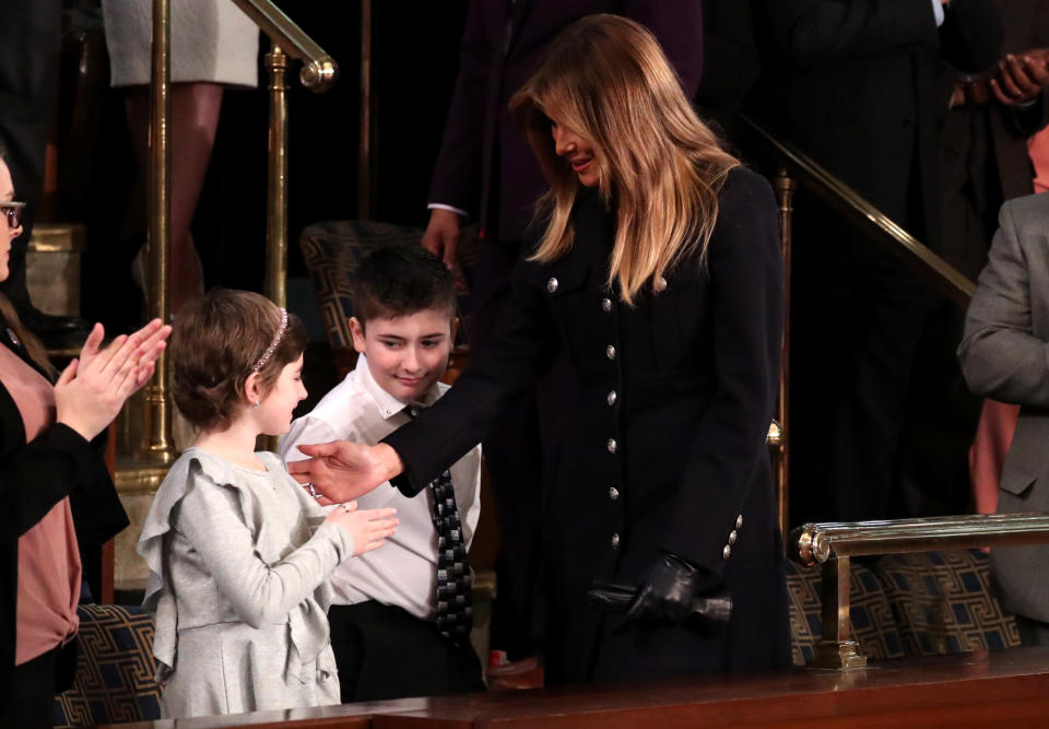 First lady Melania Trump with cancer survivor Grace Eline at the State of the Union address Tuesday night. (Photo: Jonathan Ernst/Reuters)