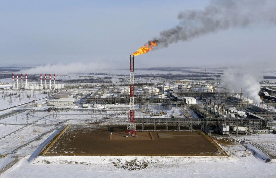 A flame burns from a tower at Vankorskoye oil field owned by Rosneft company north of the Russian Siberian city of Krasnoyarsk March 25, 2015 (Reuters)