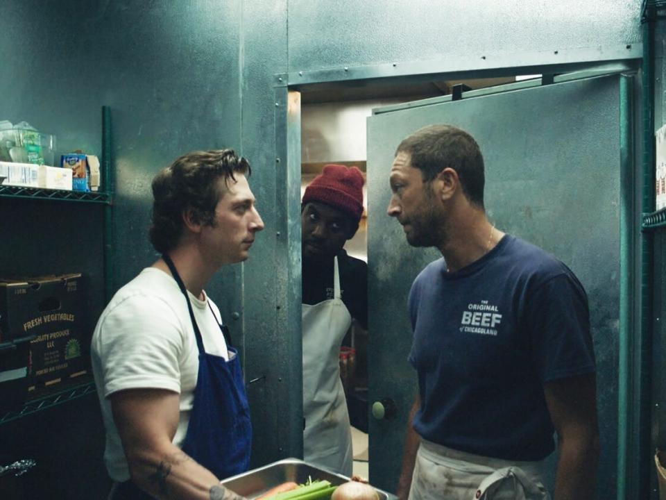 Jeremy Allen White and Ebon Moss-Bachrach in a freezer and L-Boy looking into the room on"The Bear."
