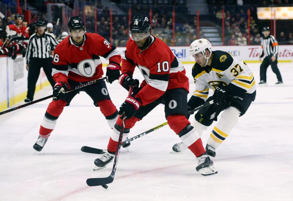 <p>
              Ottawa Senators' Anthony Duclair skates the puck as Boston Bruins' Patrice Bergeron puts pressure on during second period NHL hockey action in Ottawa, Monday, Dec. 9, 2019. (Sean Kilpatrick/The Canadian Press via AP)
            </p>