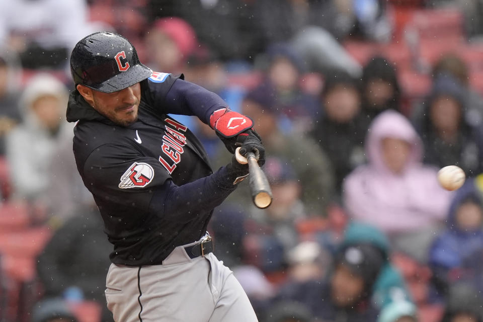 Cleveland Guardians' Ramón Laureano hits an RBI single allowing Tyler Freeman to score in the sixth inning of a baseball game against the Boston Red Sox, Thursday, April 18, 2024, in Boston. (AP Photo/Steven Senne)