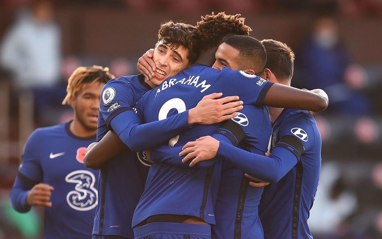 Chelsea's Hakim Ziyech (2nd right) celebrates with team-mates after scoring his side's first goal of the game during the Premier League match at Turf Moor - PA