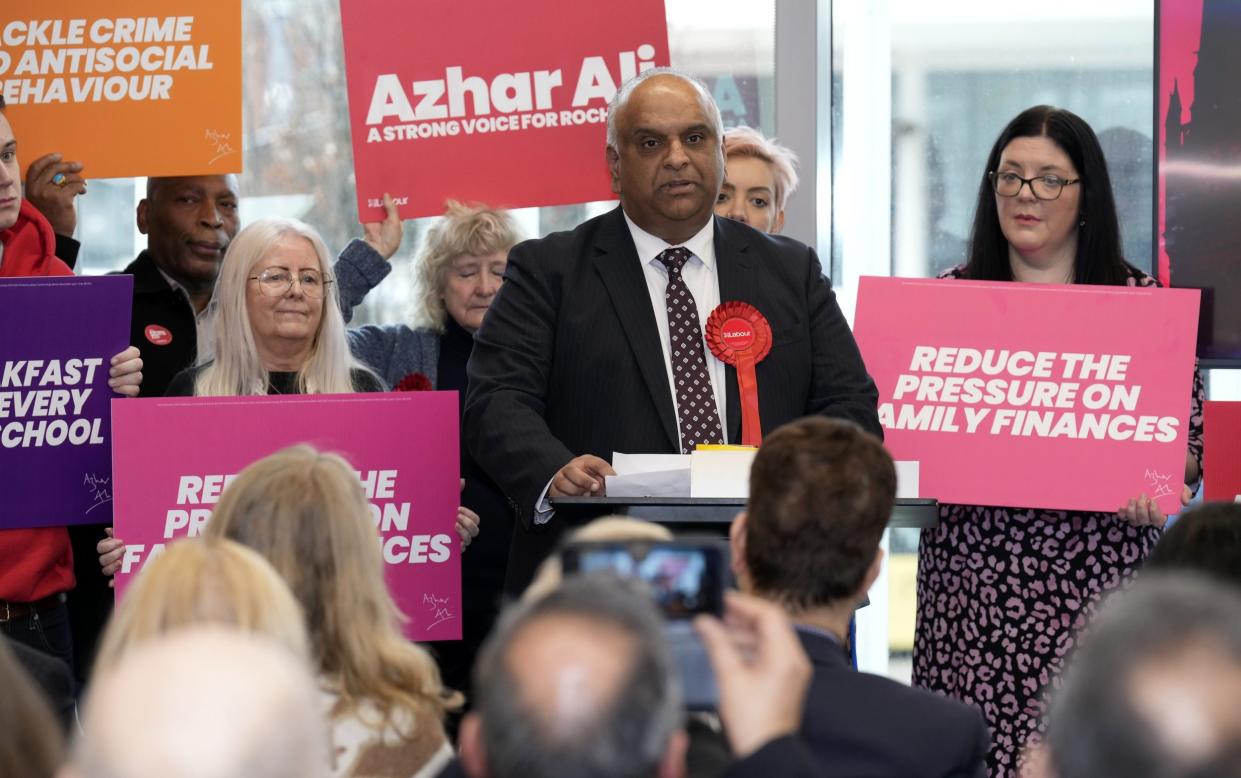 Azhar Ali (pictured centre), the former candidate for Labour, is now standing as an independent