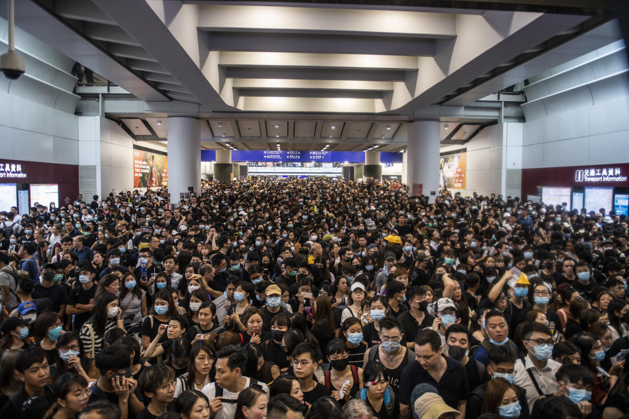 Protester are seen in Hong Kong International Airport in Hong Kong on August 12, 2019 , Tens of Thousands Protester are seen gather in Hong Kong international airport in protest of Police Brutally and the extradition bill -- Protester Clash with Police yesterday in Hong Kong -- Hong Kong International Airport suspended Flight Operation at at 15:45 Local Time Today. (Photo by Vernon Yuen/NurPhoto via Getty Images)