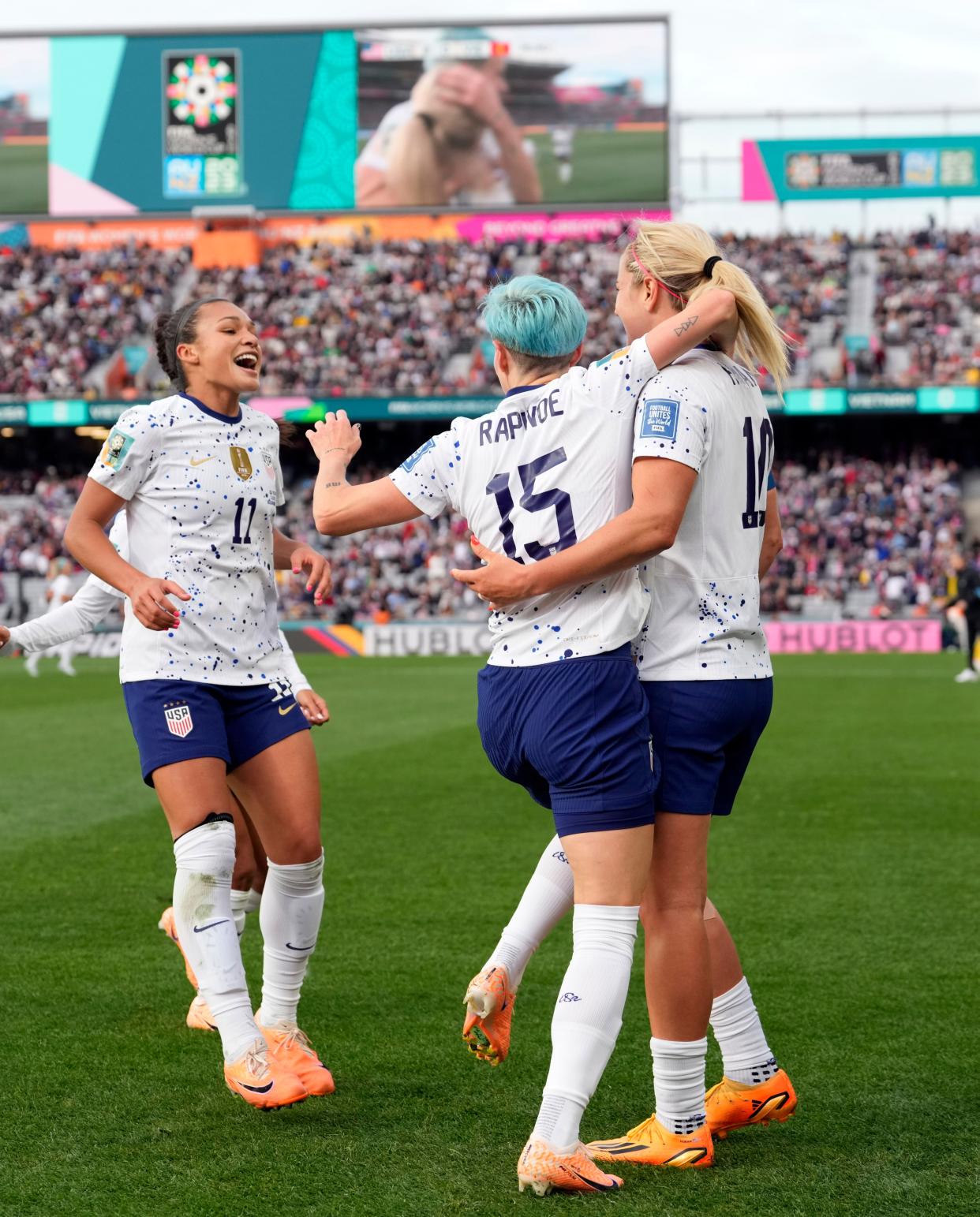 Sophia Smith joins Megan Rapinoe and Lindsey Horan for a celebration after the USA’s third goal against Vietnam on July 21, 2023 (AP Photo/Abbie Parr)