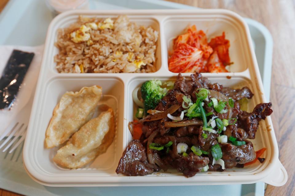 A Beef Bulgogi Bento Box with fried rice, kimchi and fried dumplings from Bento Stop in downtown Athens, Ga.