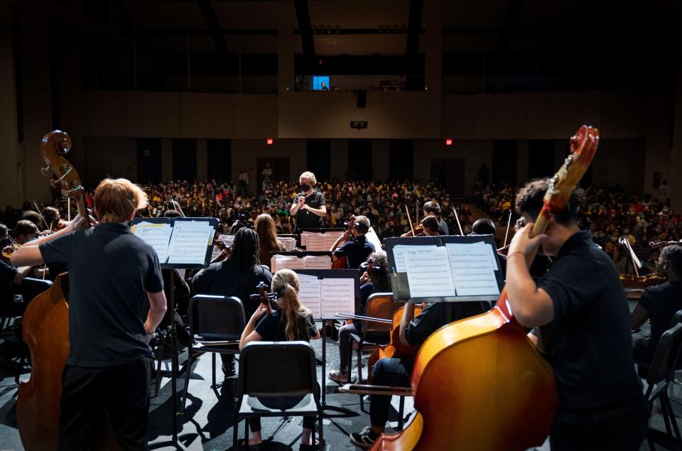 Strings director Nancy Beebe leads her students during their performance at the 8th annual Artsgiving in 2021 at the Bak Middle School of the Arts in West Palm Beach.