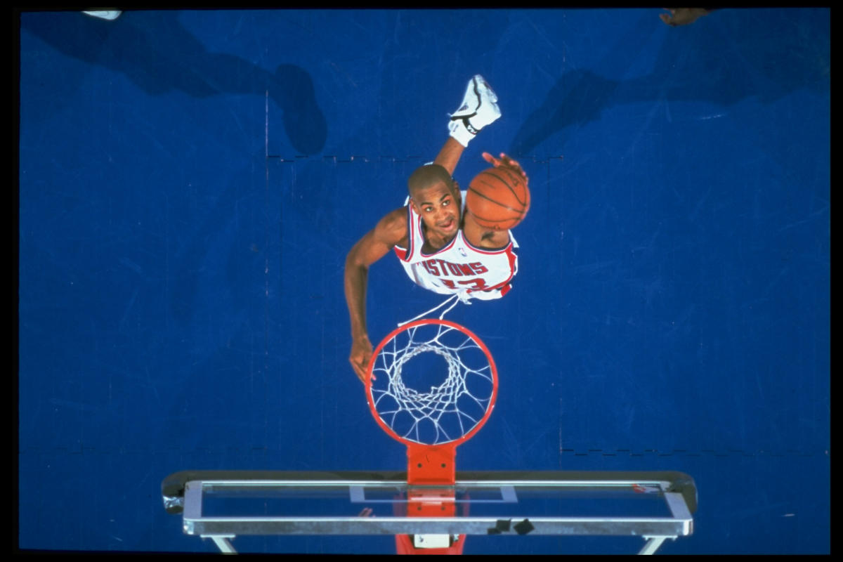 Grant Hill of the Detroit Pistons slam dunks the ball during a game News  Photo - Getty Images