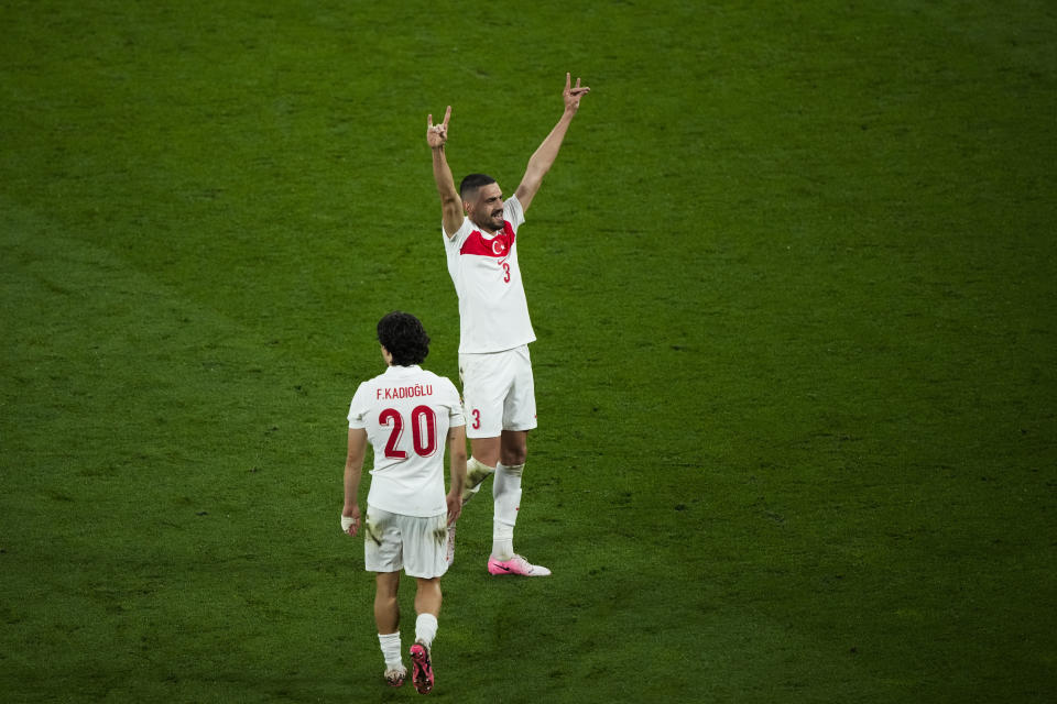 Turkey's Merih Demiral, right, celebrates after scoring his side second goal during a round of sixteen match between Austria and Turkey at the Euro 2024 soccer tournament in Leipzig, Germany, Tuesday, July 2, 2024. (AP Photo/Ebrahim Noroozi)