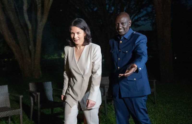 German Foreign Minister Annalena Baerbock (L) meets with Kenyan President William Samoei Ruto in the garden of the Presidential State Lodge Sagada. Michael Kappeler/dpa