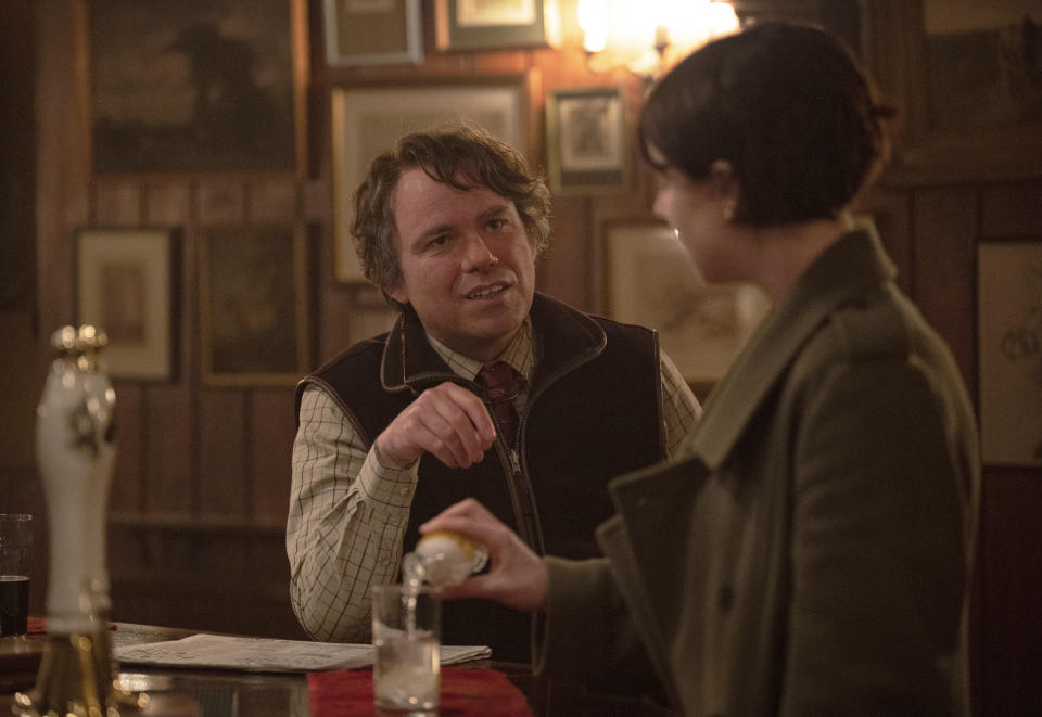 This image released by A24 shows Rory Kinnear, left, and Jessie Buckley in a scene from "Men." (Kevin Baker/A24 via AP)