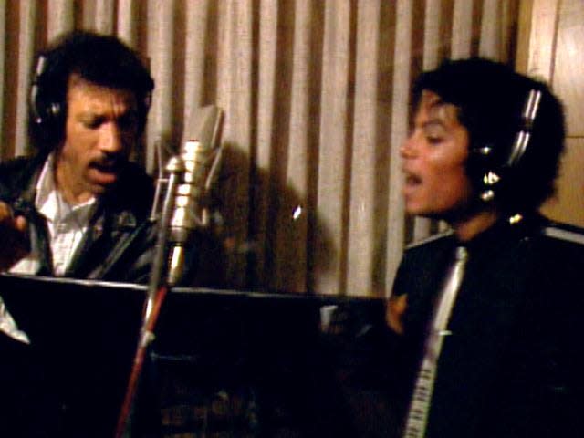 Lionel Richie (left) and Michael Jackson rehearse "We Are the World."