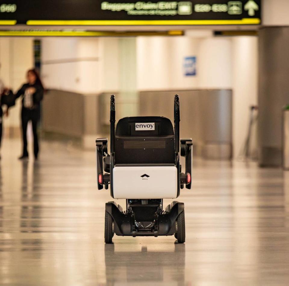 The WHILL autonomous wheelchair self-returns to a gate in Concourse E after a test run at Miami International Airport on Friday, June 21, 2024 in Miami, Fla. The wheelchair is programmed to return back to its pick-up location after dropping off a passenger at their gate.