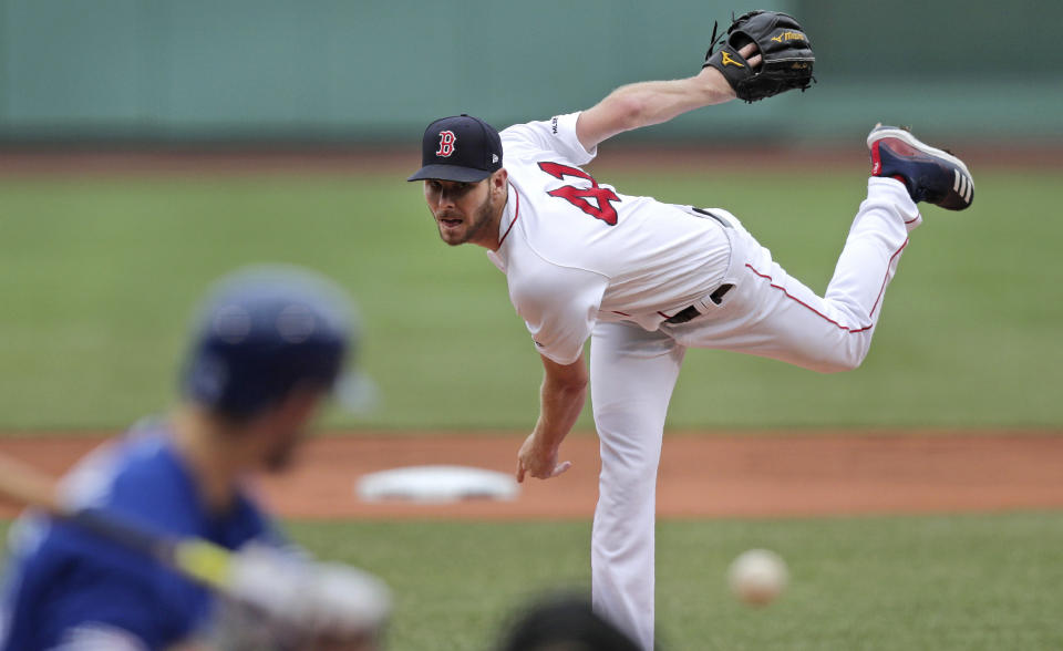 Boston Red Sox starting pitcher Chris Sale delivers during the first inning of a baseball game against the Toronto Blue Jays at Fenway Park in Boston, Thursday, July 18, 2019. (AP Photo/Charles Krupa)