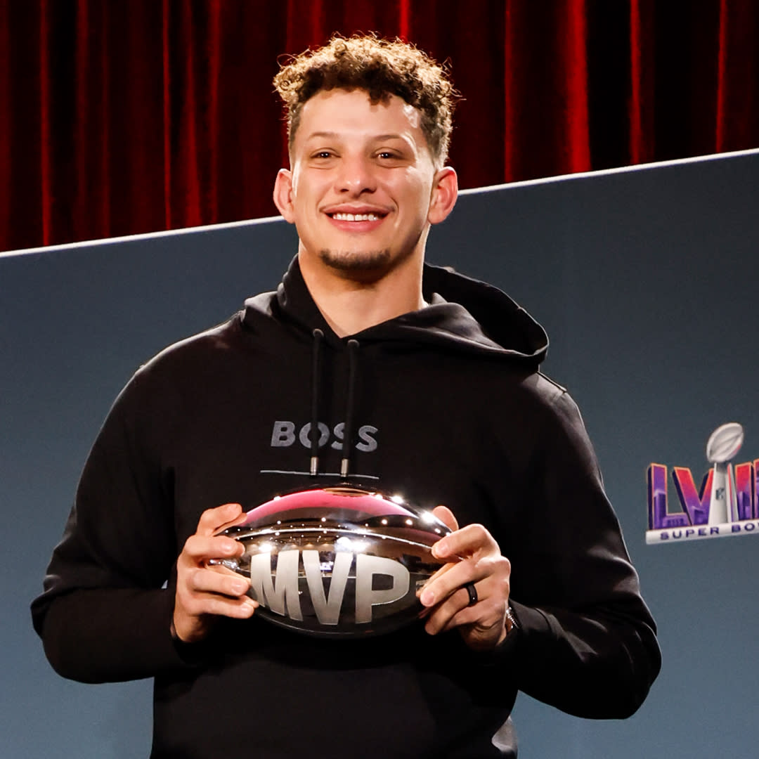  Quarterback Patrick Mahomes #15 of the Kansas City Chiefs pose after being presented the Pete Rozelle Trophy as Super Bowl LVIII Most Valuable Players. 