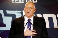 Benny Gantz, leader of Blue and White, gestures as he delivers a statement before his party faction meeting in Tel Aviv, Israel