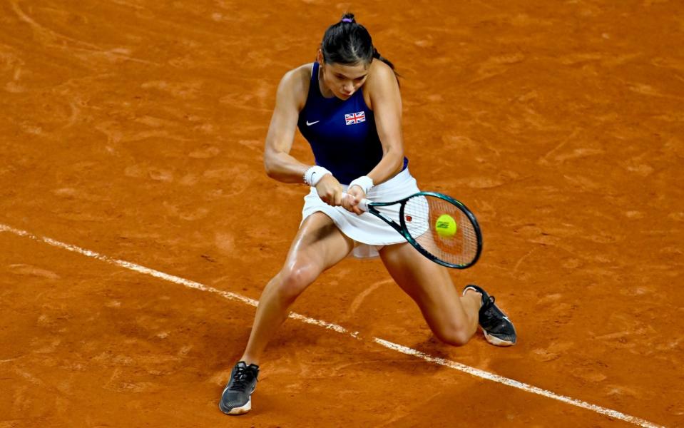 Emma Raducanu of Great Britain plays a backhand against Caroline Garcia of France during the Billie Jean King Cup Qualifier match between France and Great Britain at Le Chaudron