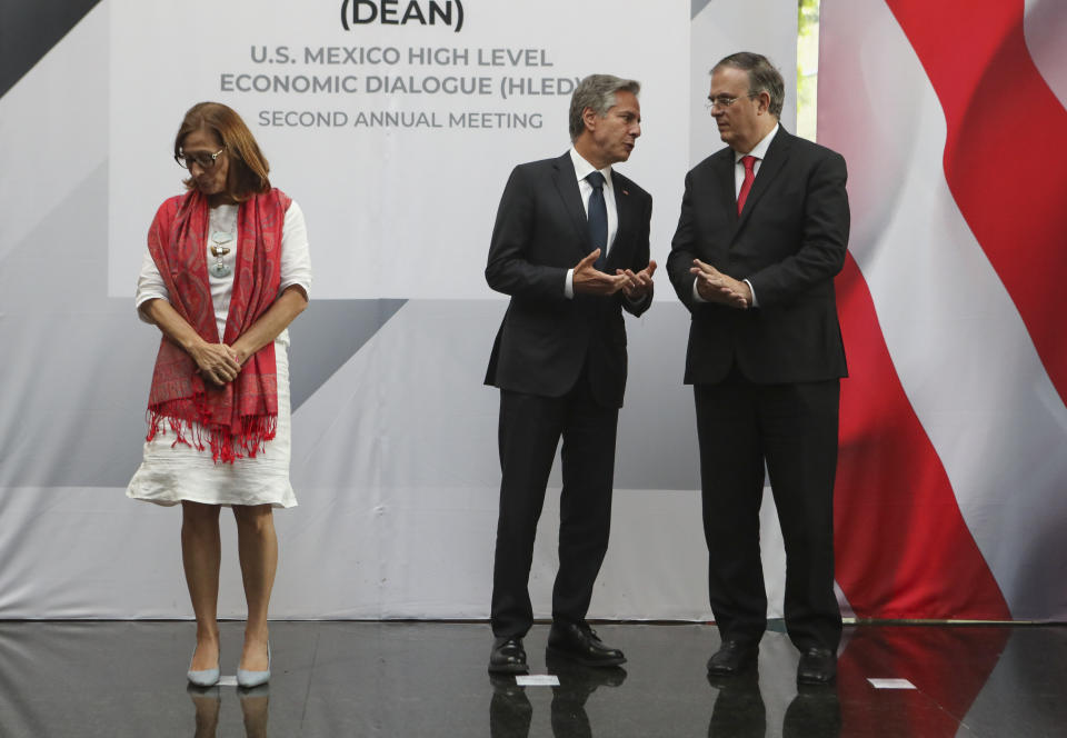 FILE - Mexico's Economy Minister Tatiana Clouthier, left, stands with U.S. Secretary of State Antony Blinken, center, and Mexico's Foreign Minister Marcelo Ebrard during a photo opportunity after the High-Level Economic Dialogue Second Annual Meeting in Mexico City, Sept. 12, 2022. Clouthier resigned Thursday, Oct. 6 in an emotional speech in which her voice broke as she thanked Mexican President Andrés Manuel López Obrador, but in which she gave no specific reason for her departure. (Raquel Cunha/Pool via AP, File)