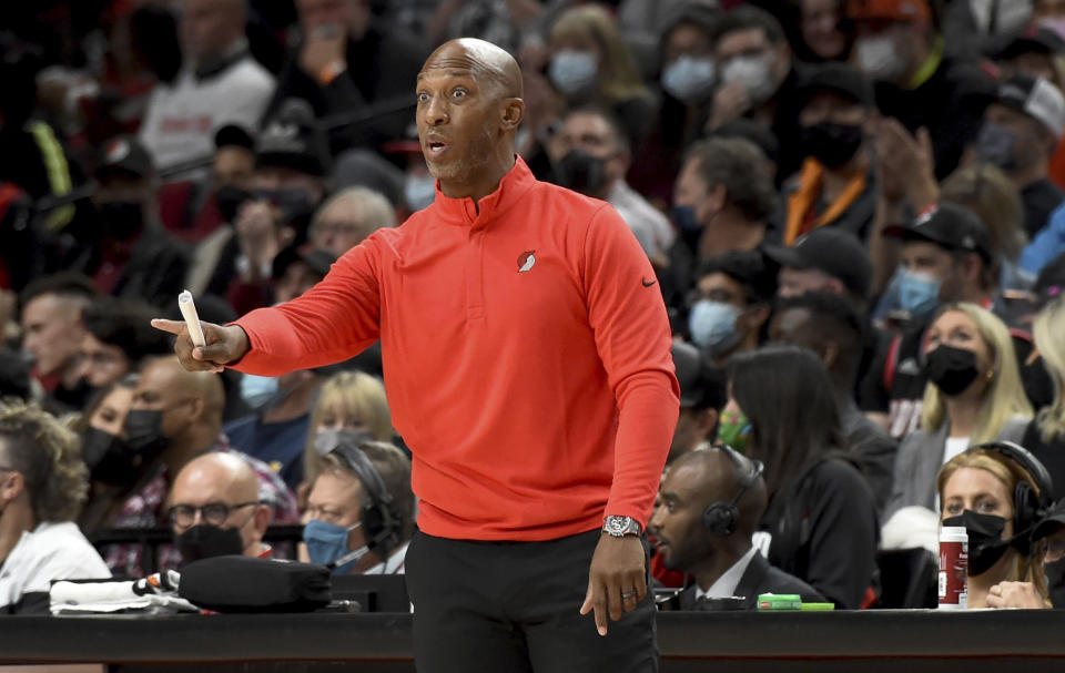 Portland Trail Blazers coach Chauncey Billups talks to the team during the first half an NBA basketball game against the Sacramento Kings in Portland, Ore., Wednesday, Oct. 20, 2021. (AP Photo/Steve Dykes)