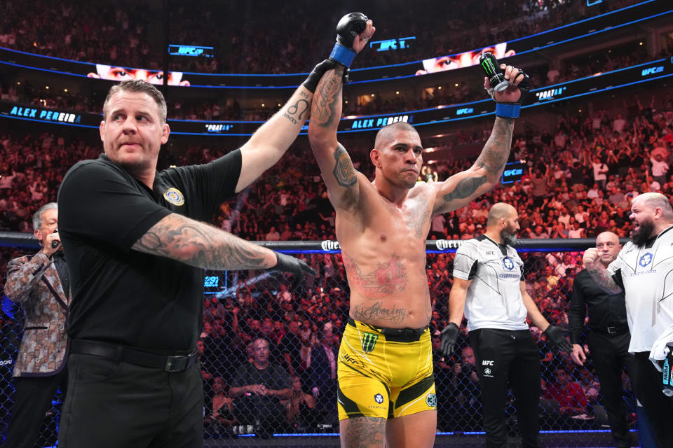 SALT LAKE CITY, UTAH - JULY 29:  Alex Pereira of Brazil celebrates his victory over  in a light heavyweight fight during the UFC 291 event at Delta Center on July 29, 2023 in Salt Lake City, Utah. (Photo by Josh Hedges/Zuffa LLC via Getty Images)