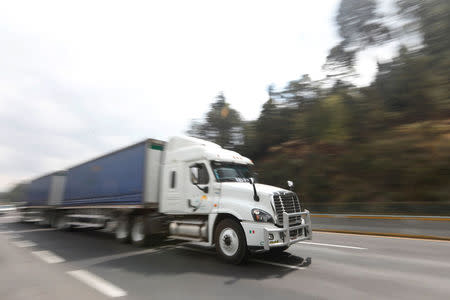 A trailer passes on the Mexico-Puebla highway, on the outskirts of Mexico City, Mexico, March 8, 2018. Picture taken March 8, 2018. REUTERS/Edgard Garrido