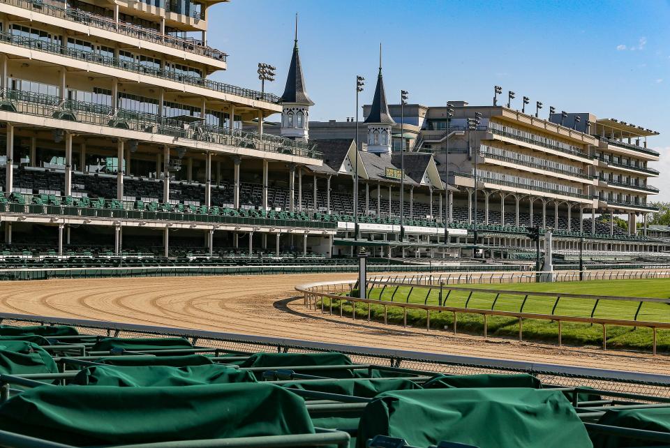 Churchill Downs racetrack sits empty on Saturday, May 2, 2020, in Louisville, Kentucky, on what would have been the 146th Running of The Kentucky Derby.  The race has been run 145 consecutive times but had to postpone until September 5, 2020, because of the coronavirus.