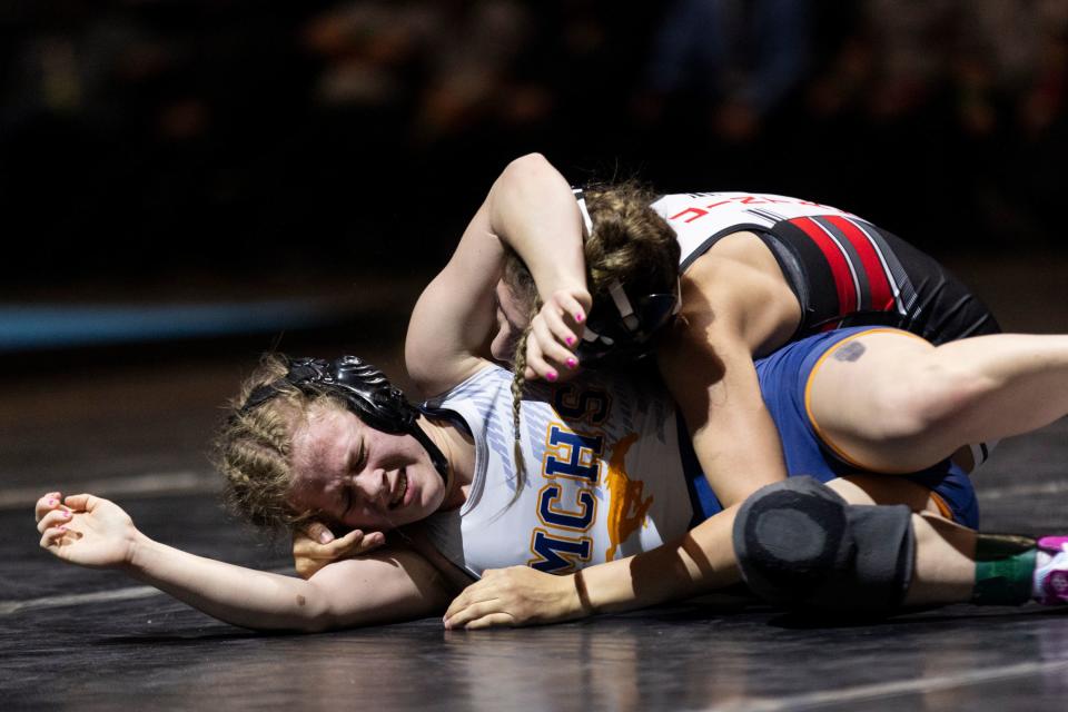 Addilyn Baxter of Mountain Crest and Kenna Mccauley of Uintah compete in the 4A Girls Wrestling State Championships at the UCCU Center in Orem on Thursday, Feb. 15, 2024. | Marielle Scott, Deseret News