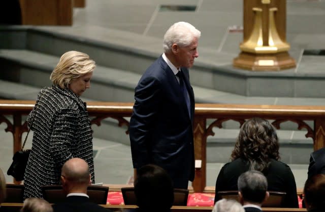 Bill and Hillary Clinton were also in attendance and sat next to the Obamas.