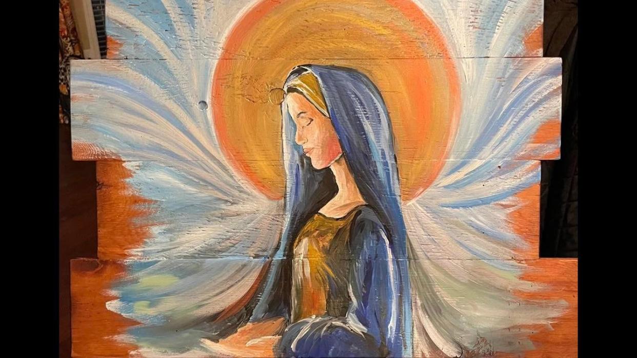 St. Frances Cabrini School’s curriculum director, Kim Ashy, painted the Virgin Mary on a repurposed kneeler from the old Cabrini Church. The painting is one of the silent auction items for the Alexandria school's 75th Anniversary Gala.