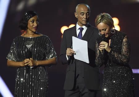 Wham band members Andrew Ridgeley, Pepsi and Shirley pay tribute to George Michael at the Brit Awards at the O2 Arena in London, Britain, February 22, 2017. REUTERS/Toby Melville