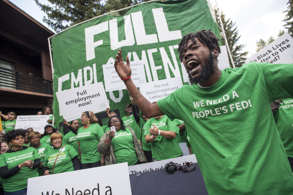 Rod Adams (foreground) rallies Fed Up activists at the 2016 Jackson Hole economic symposium. That year, Fed Up held a discussion with 10 Federal Reserve leaders. (Photo: David Paul Morris/Bloomberg via Getty Images)