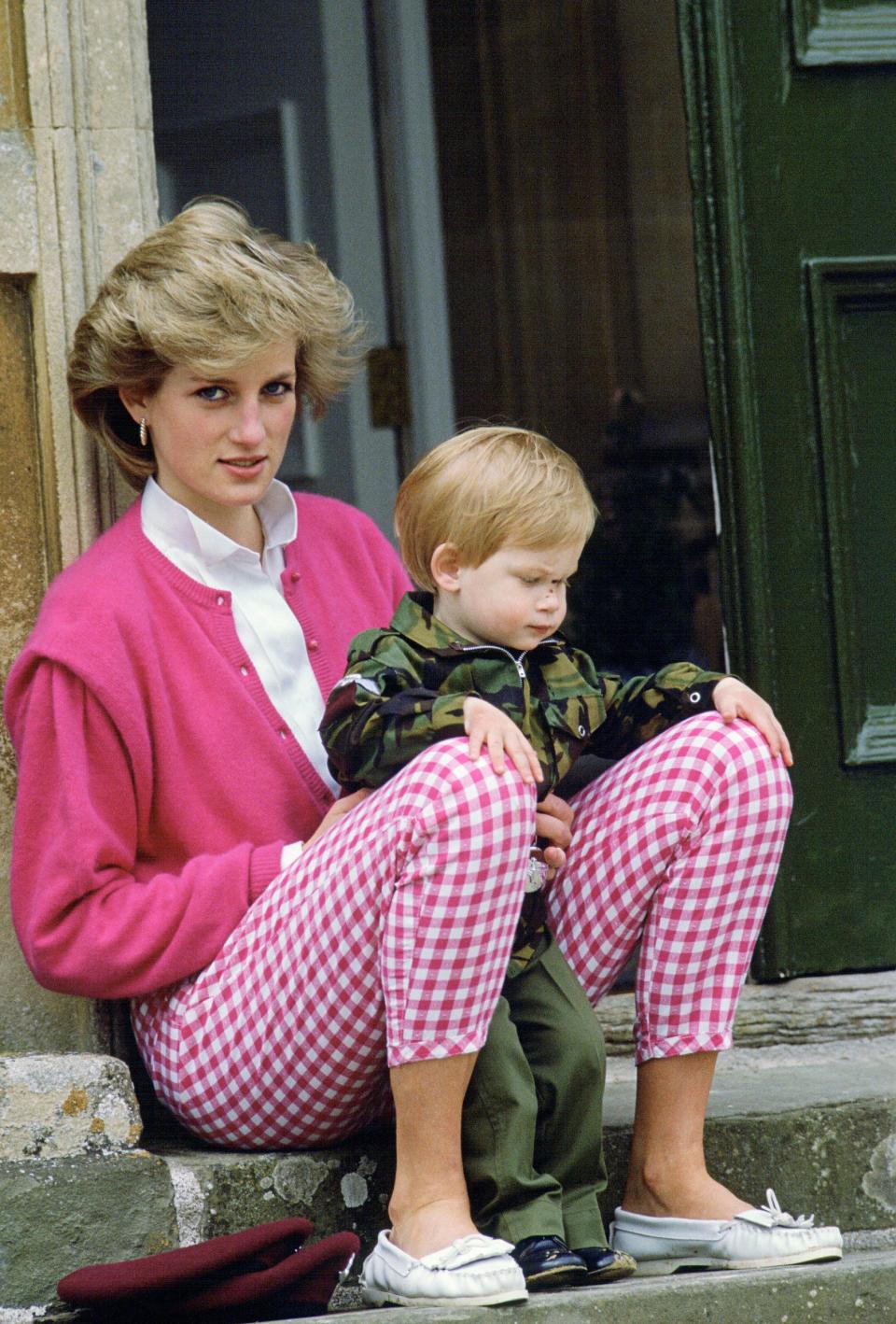 Princess Diana Sitting Outside Highgrove With Her Son Harry Who Is In Uniform As A Soldier - Credit: Tim Graham/Getty