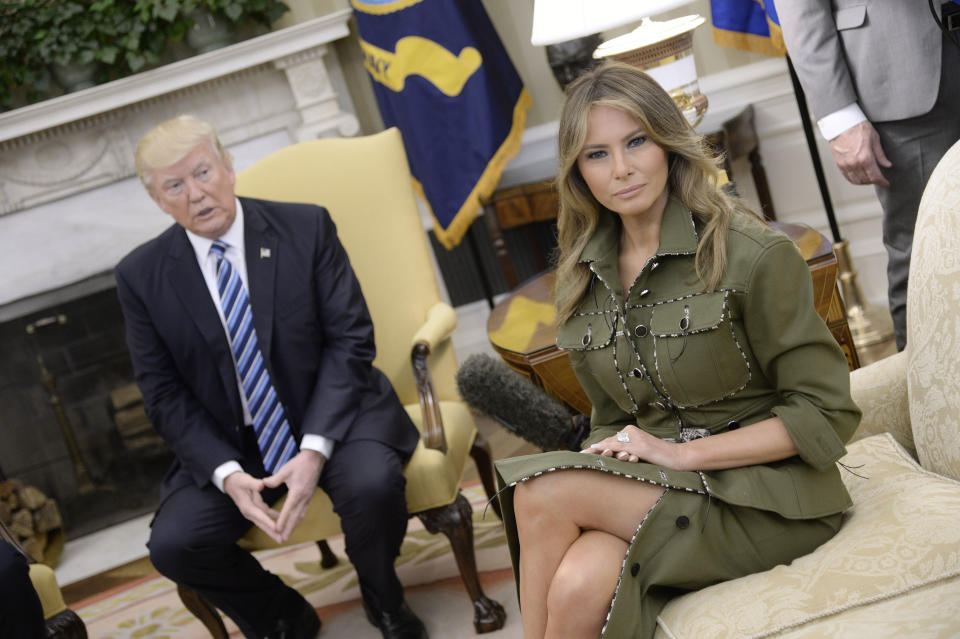 US President Donald Trump and First Lady Melania Trump look on during a meeting with President Mauricio Macri of Argentina and his wife Juliana Awada in the Oval Office of the White House in Washington, DC, on April 27, 2017. Photo by Olivier Douliery *** Please Use Credit from Credit Field ***