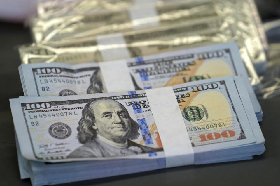 Counterfeit American currency is displayed at the U.S. Customs and Border Protection overseas mail inspection facility at Chicago's O'Hare International Airport Feb. 23, 2024, in Chicago. The explosive growth of cross-border e-commerce involving major China-backed players such as Shein and Temu has caught the attention of the U.S. lawmakers amid a bitter U.S.-China trade war and cast a spotlight on a tax rule that critics say has allowed hundreds of millions of China-originated packages to enter the U.S. market each year without duty and without reliable information for lawfulness. (AP Photo/Charles Rex Arbogast)