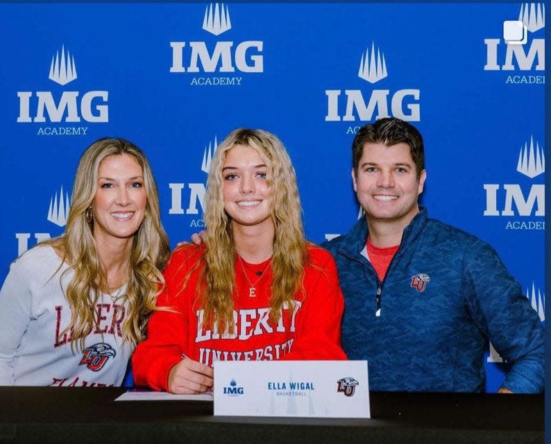 Granville resident Ella Wigal, a senior at IMG Academy, recently signed her letter of intent to play basketball at Liberty University.