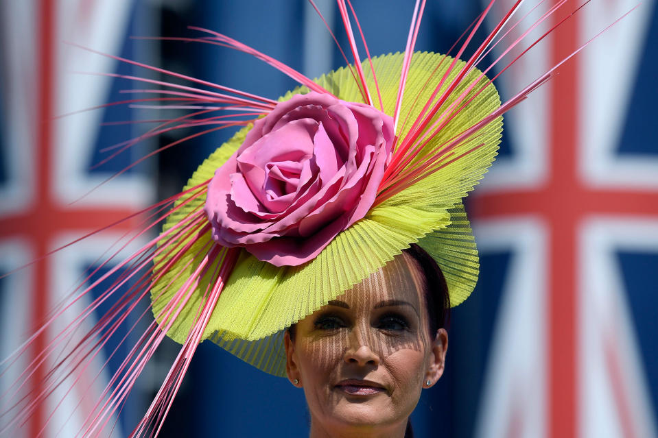 <p>A racegoer at Ascot Racecourse at the Royal Ascot on June 20, 2017. (Toby Melville/Reuters) </p>