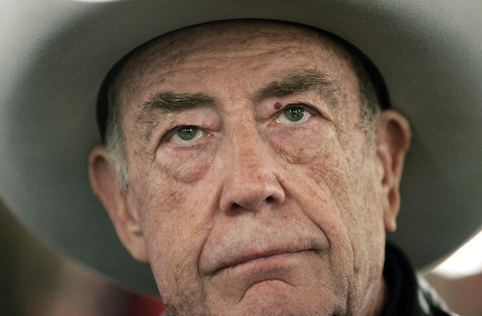 FILE - Two-time champion Doyle Brunson stares down an opponent in the World Series of Poker at the Rio Hotel and Casino in Las Vegas on July 9, 2005. Brunson, one of the most influential poker players of all time and a two-time world champion, died Sunday, May 14, 2023, according to his agent. He was 89. (AP Photo/Joe Cavaretta, File)