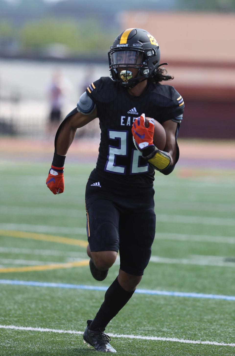 East/WOI's Anthony Ramon Diaz returns a punt for a touchdown during East High School/World of Inquiry School's home football game against Greece Olympia/Odyssey High School on September 18, 2021.