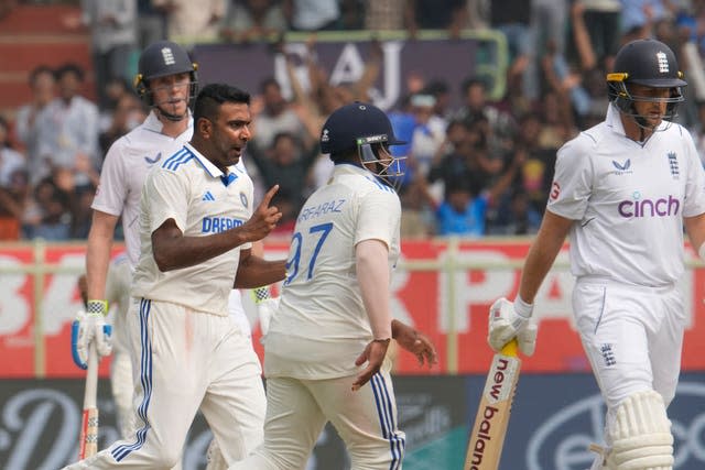 India’s Ravichandran Ashwin, second left, celebrates dismissing Joe Root