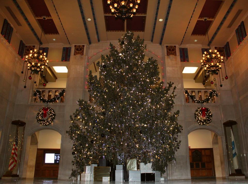 A massive Norway Spruce is decorated and lit up for guests to see in the Great Hall of the Purdue Memorial Union. The tree is from Purdue's own grounds and is scheduled to stay up through Dec. 26.