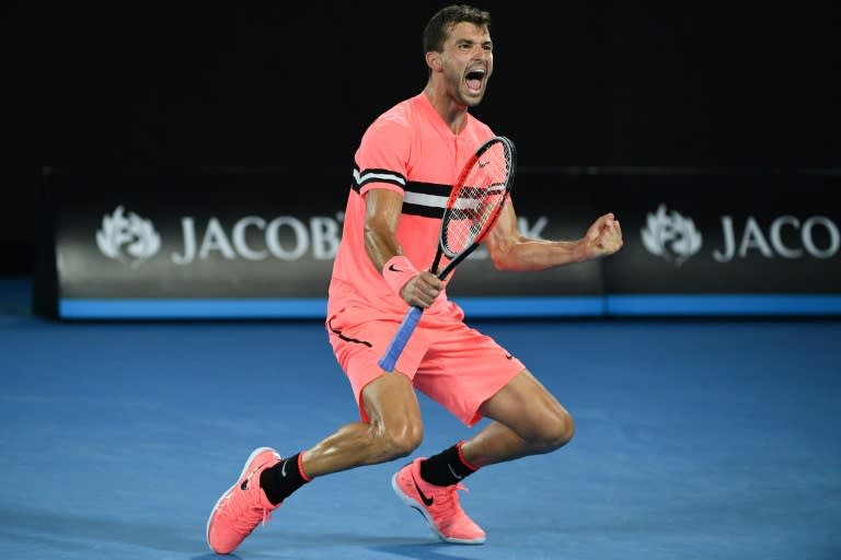 Bulgaria's Grigor Dimitrov celebrates beating Australia's Nick Kyrgios in their men's singles match at the Australian Open in Melbourne on January 21, 2018