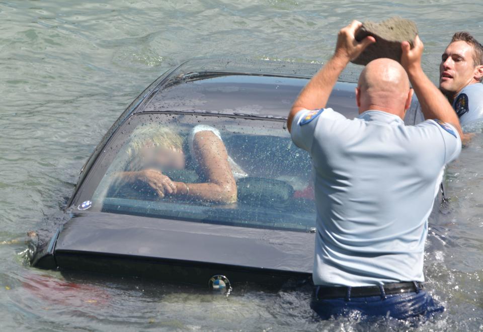 Rescuers save a woman&nbsp;whose car had <a href="http://www.huffingtonpost.com/2015/02/17/police-rescue-drowning-woman-from-car_n_6699980.html">rolled&nbsp;into the water</a>&nbsp;in Auckland, New Zealand, on Feb. 17. The two police officers who pulled the woman to safety said they were just doing their job.