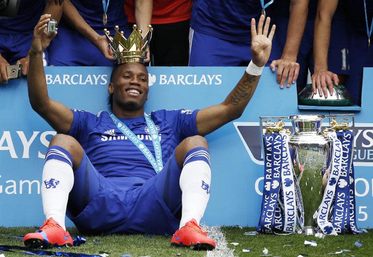 Chelsea's Didier Drogba celebrates winning the Premier League on the last day of the season, and also his last game with the club on May 24, 2015